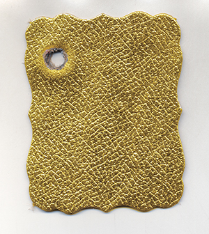 Фотокнига в обложке из золотой кожи