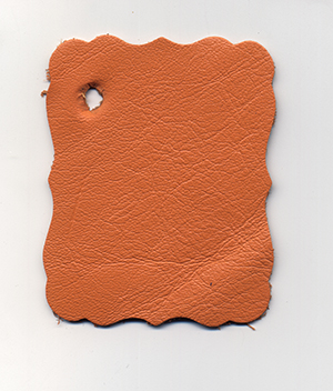 Фотокнига в обложке из оранжевой кожи